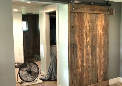 sliding barn door, wood flooring