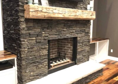 custom fire place with wood flooring